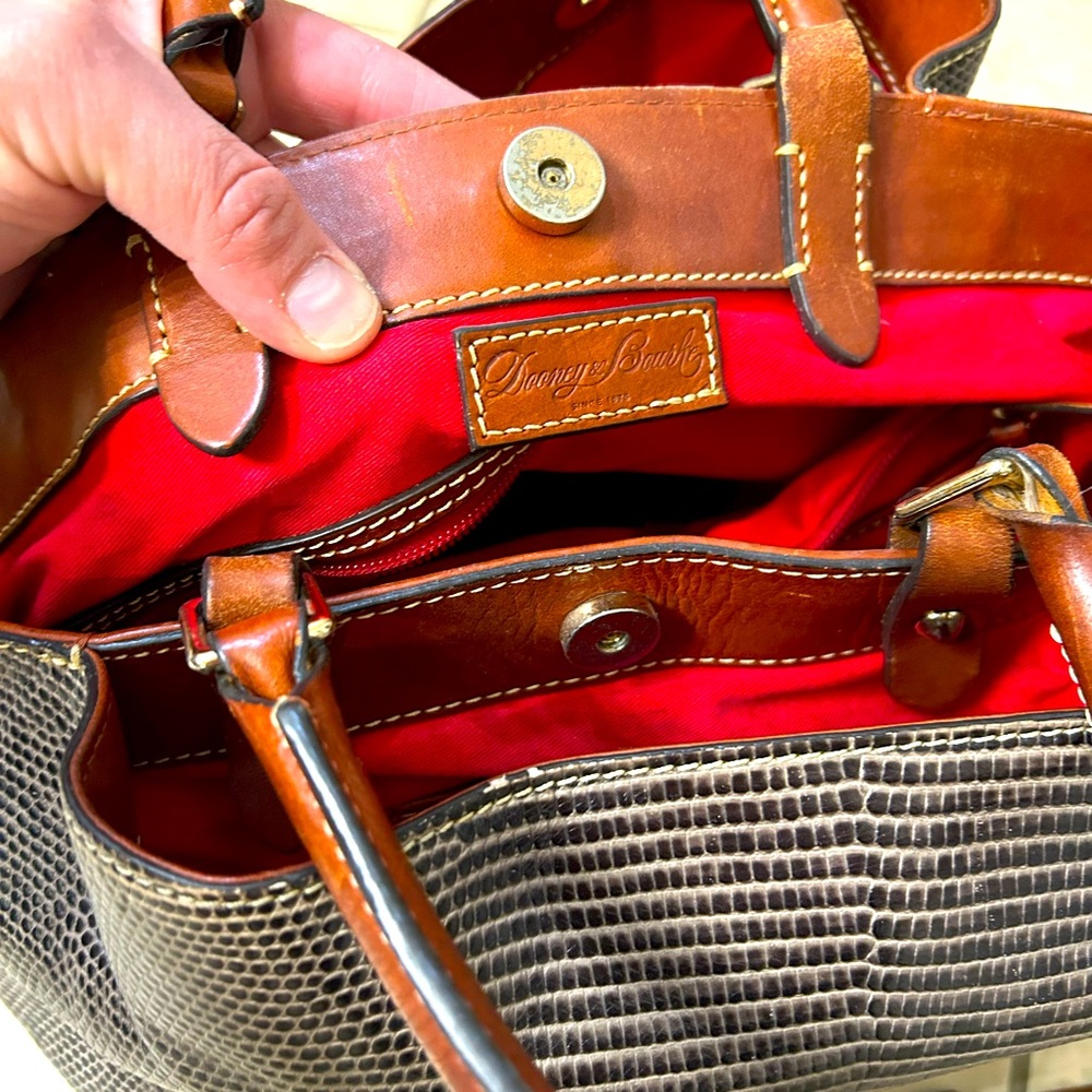 Dooney and Bourke purse. The bag is a satchel or crossbody bag!